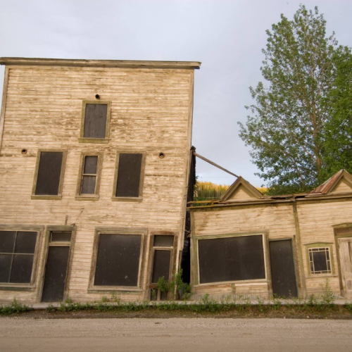 Decrepit buildings lean against each other in Dawson City